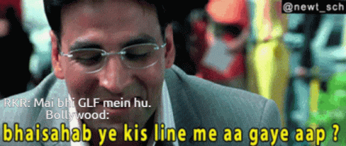 A Man Wearing Glasses Is Laughing With The Caption Rkr Mai Bh Glf Mein Hu GIF
