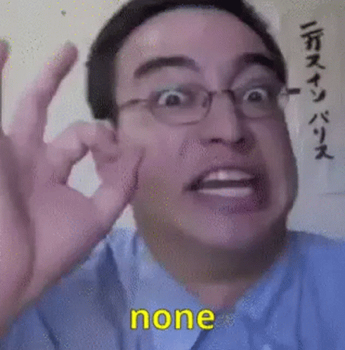 A Man Wearing Glasses Is Making A Funny Face And Giving The Ok Sign . GIF