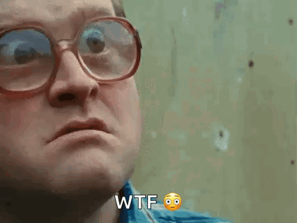 A Man Wearing Glasses Is Making A Funny Face And Says Wtf GIF