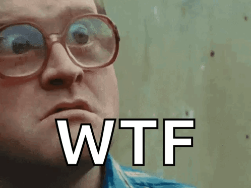 A Man Wearing Glasses Is Making A Funny Face And The Word Wtf Is On The Screen . GIF