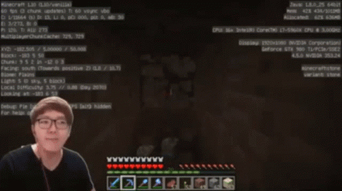 A Man Wearing Glasses Is Playing A Video Game On A Computer GIF
