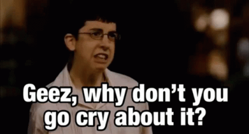 A Man Wearing Glasses Is Saying Geez Why Don 'T You Go Cry About It ? GIF