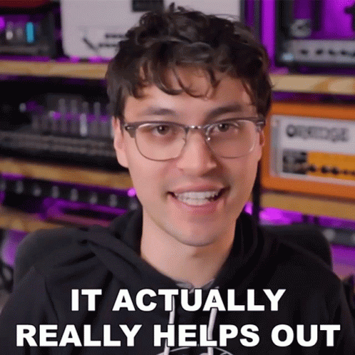 A Man Wearing Glasses Is Smiling And Says It Actually Helps Out GIF