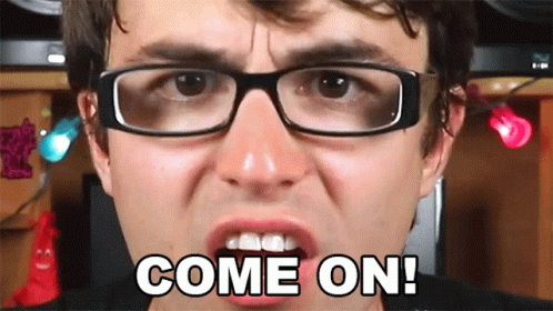 A Man Wearing Glasses Says Come On In Front Of Him GIF