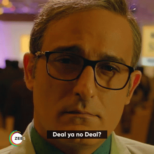 A Man Wearing Glasses Says " Deal Ya No Deal " On The Screen GIF