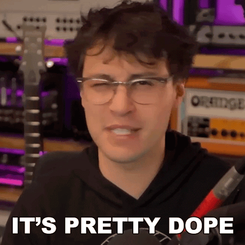 Man With Glasses Saying It's Pretty Dope In Front Of Guitar GIF