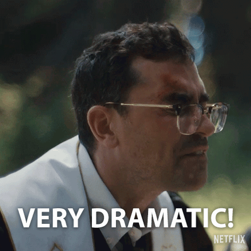 A Man Wearing Glasses Says Very Dramatic On A Netflix Advertisement GIF