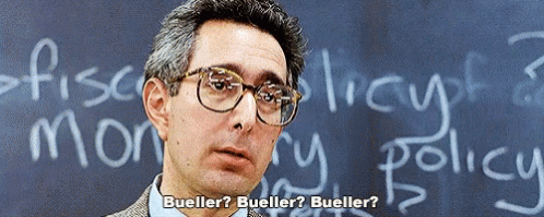 A Man Wearing Glasses Stands In Front Of A Blackboard With The Words Bueller Bueller Bueller Written On It GIF