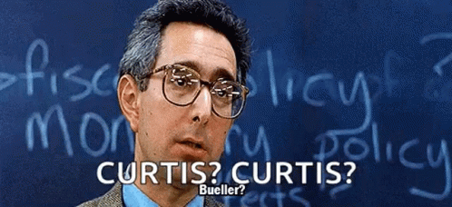 A Man Wearing Glasses Stands In Front Of A Chalkboard That Says Curtis Curtis Bueller GIF