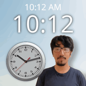 A Man Wearing Glasses Stands In Front Of A Clock That Says 10:12 Am GIF