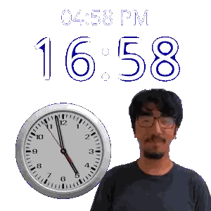 a man wearing glasses stands in front of a clock that says 1658