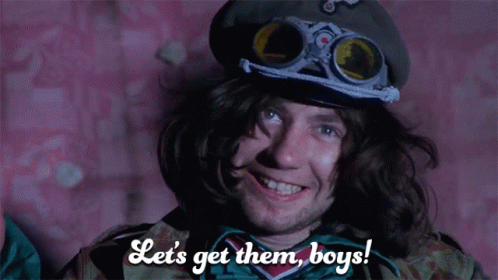 A Man Wearing Goggles And A Hat Says Let 'S Get Them Boys GIF