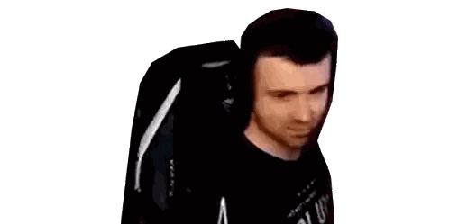 a man wearing headphones and a black shirt is sitting in a chair .