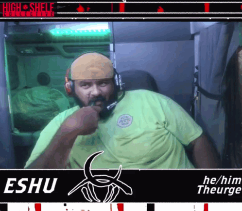A Man Wearing Headphones And A Green Shirt With The Name Eshu GIF
