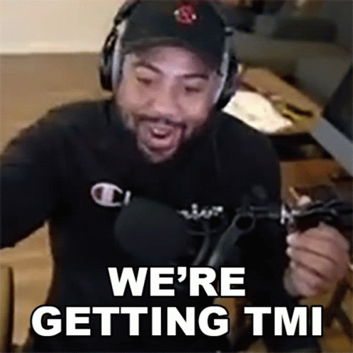 A Man Wearing Headphones And A Hat Is Saying We 'Re Getting Tmi . GIF