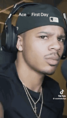 A Man Wearing Headphones And A Hat That Says Ace First Day On It GIF