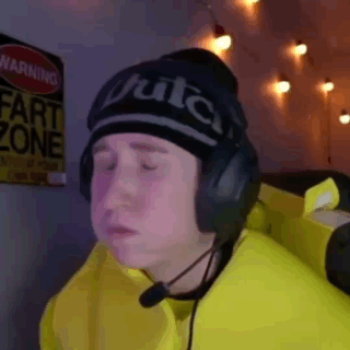 a man wearing headphones and a hat that says fruitca on it