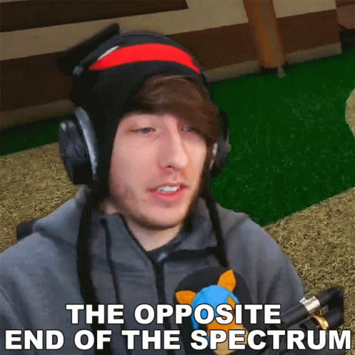 A Man Wearing Headphones And A Hat With The Words The Opposite End Of The Spectrum Below Him GIF