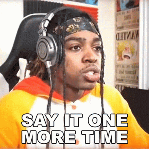 a man wearing headphones and a headband says say it one more time .