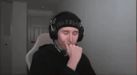 a man wearing headphones and a headband that says 6160 on it