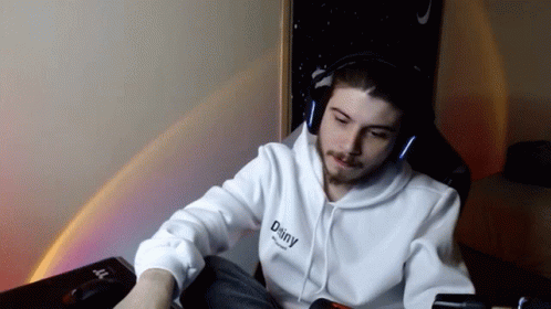 A Man Wearing Headphones And A Hoodie That Says Dairy On It GIF