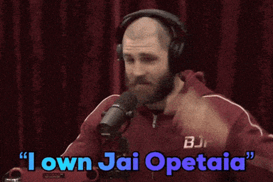 A Man Wearing Headphones And A Jacket That Says Bjp On It GIF