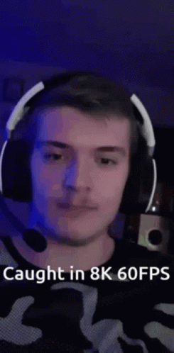 A Man Wearing Headphones And A Microphone Is Caught In 8K 60 Fps . GIF
