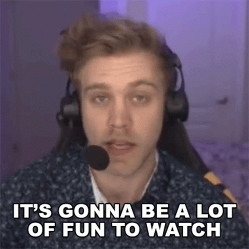 A Man Wearing Headphones And A Microphone Is Sitting In Front Of A Computer Screen . GIF