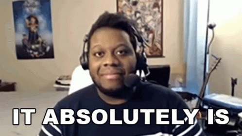 A Man Wearing Headphones And A Microphone Says It 'S Absolutely Is . GIF