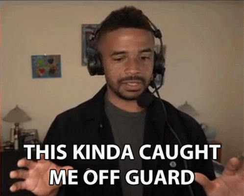 A Man Wearing Headphones And A Microphone Says " This Kinda Caught Me Off Guard " GIF