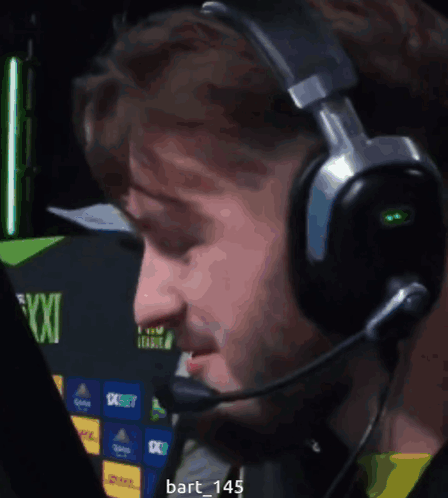 A Man Wearing Headphones And A Microphone With The Name Bart 145 On The Bottom Right GIF