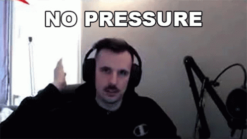 A Man Wearing Headphones And A Mustache Is Sitting In Front Of A Microphone And Says No Pressure . GIF