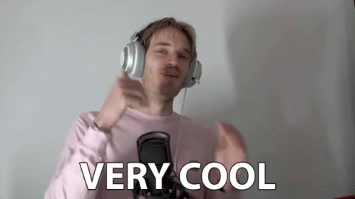 A Man Wearing Headphones And A Pink Shirt Is Giving A Thumbs Up Sign . GIF