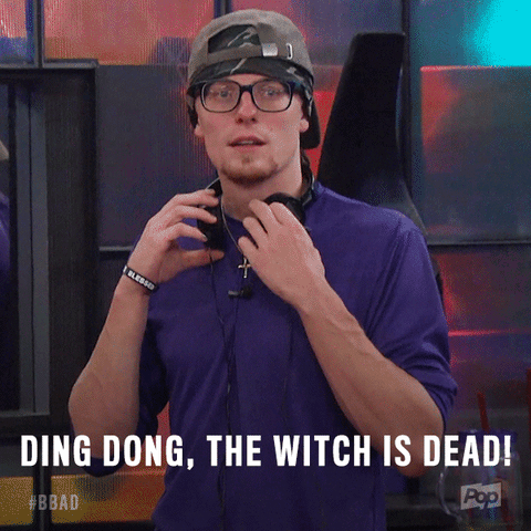 A Man Wearing Headphones And A Purple Shirt Says " Ding Dong The Witch Is Dead " GIF