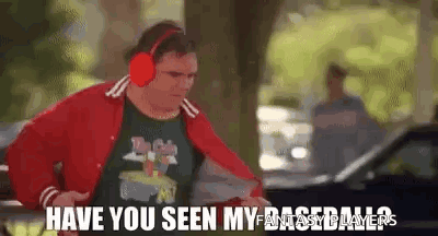 A Man Wearing Headphones And A Red Jacket Is Standing Next To A Car And Says `` Have You Seen My Fantasy Baseball ? '' GIF