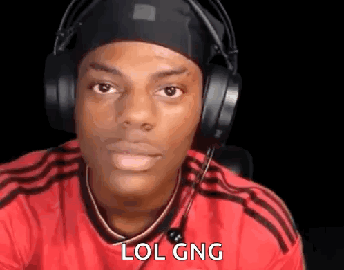 A Man Wearing Headphones And A Red Shirt Is Looking At The Camera And Saying Lol Gng . GIF