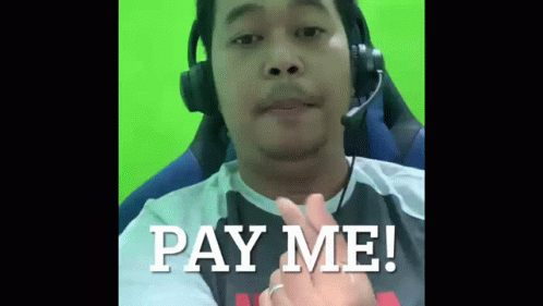 A Man Wearing Headphones And A Ring Says Pay Me GIF