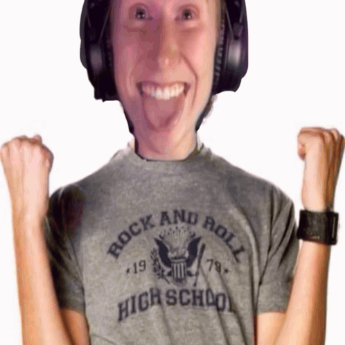 a man wearing headphones and a rock and roll high school t-shirt