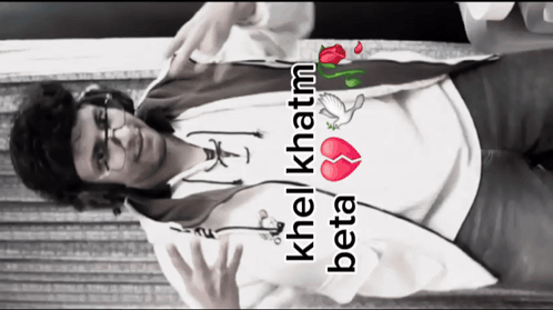 A Man Wearing Headphones And A Shirt That Says Khel Khatm Beta On It GIF