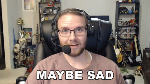 A Man Wearing Headphones And A Shirt That Says " Maybe Sad " GIF
