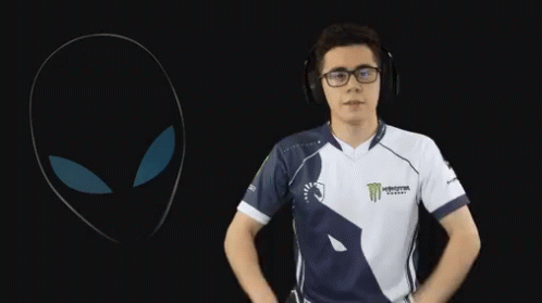 A Man Wearing Headphones And A Shirt That Says Monster GIF