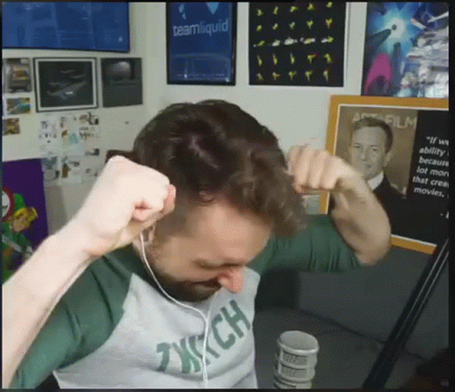 A Man Wearing Headphones And A Shirt That Says Tech On It GIF