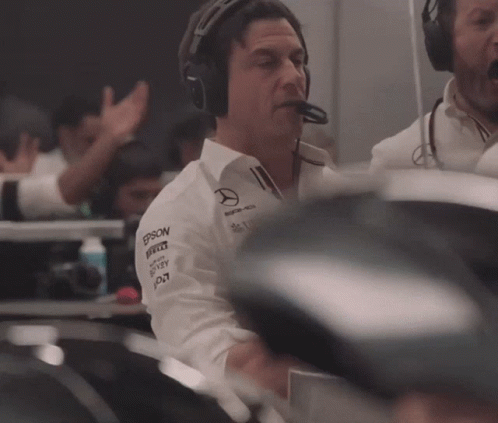 A Man Wearing Headphones And A Shirt With Epson Written On It GIF