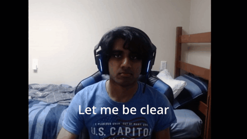 A Man Wearing Headphones And A U.s. Capitol Shirt Says Let Me Be Clear GIF