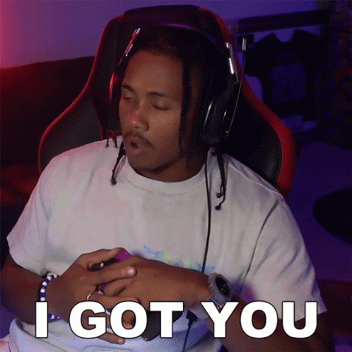 A Man Wearing Headphones And A White Shirt Says I Got You GIF