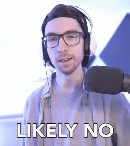 a man wearing headphones and glasses says likely no in front of a microphone