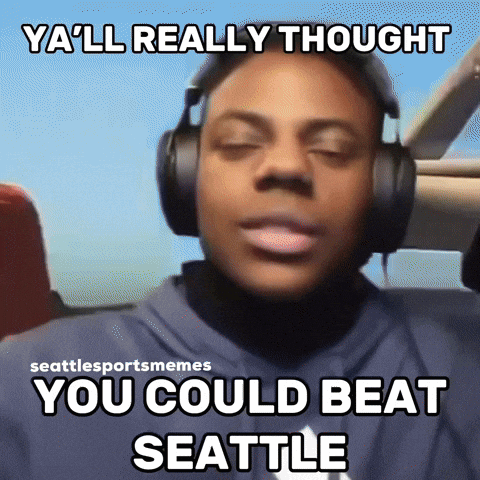 A Man Wearing Headphones Has A Meme That Says Ya 'Ll Really Thought You Could Beat Seattle GIF