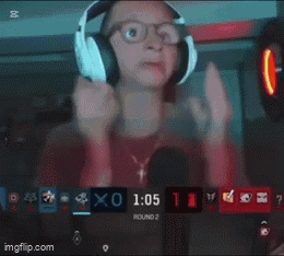 A Man Wearing Headphones Is Holding A Remote Control And Says To The Right Coming Through That Door Left Left .. GIF