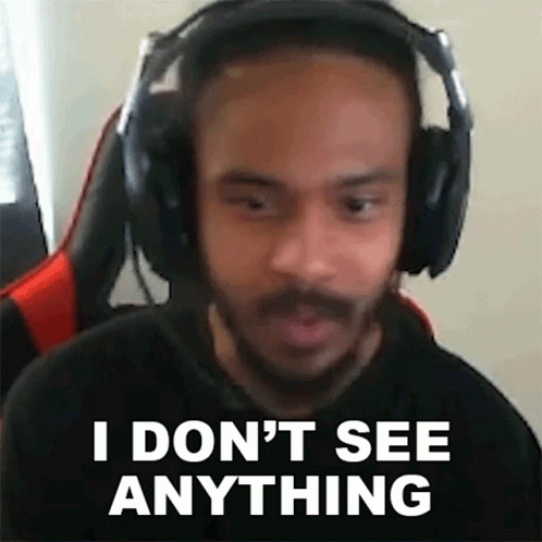 A Man Wearing Headphones Is Making A Funny Face And Saying `` I Don T See Anything '' . GIF