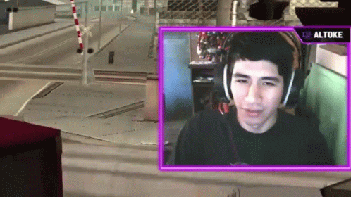 a man wearing headphones is playing a video game with a purple overlay that says ' altos ' on it